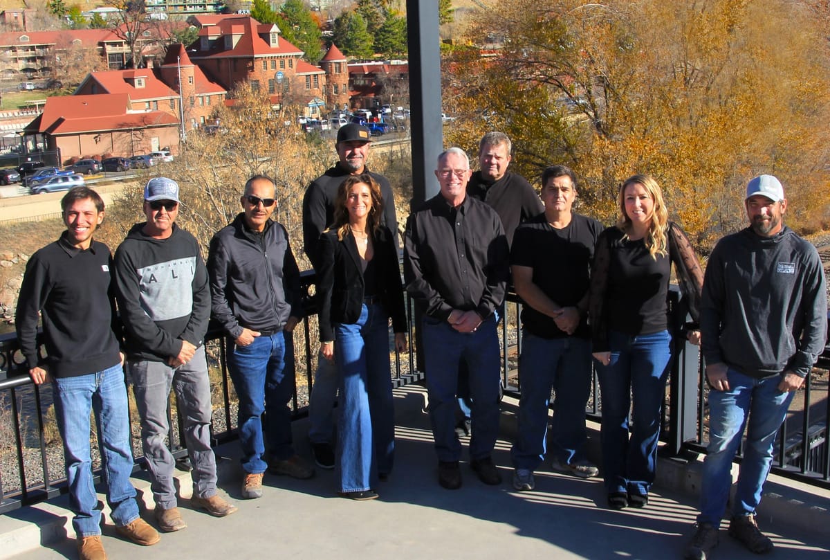 The D.M. Neuman Construction crew standing together outside a completed Glenwood Springs project