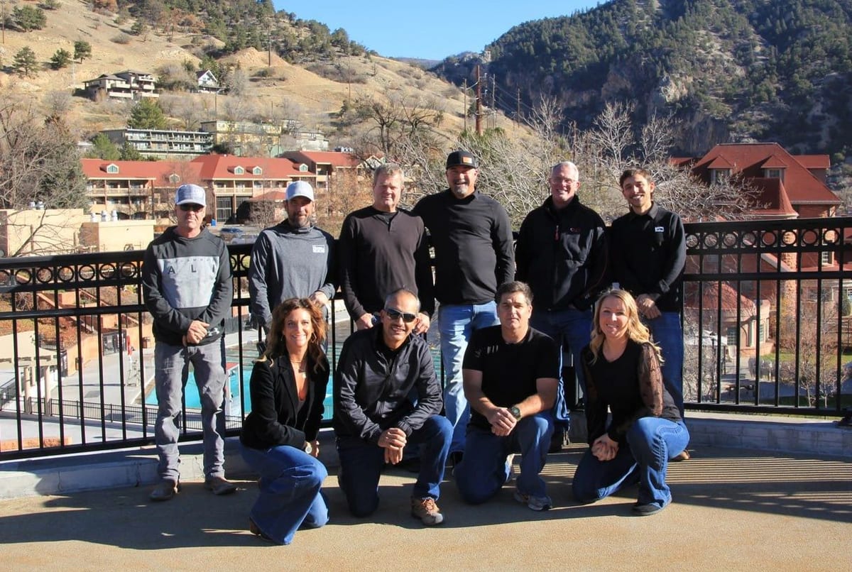 The D.M. Neuman Construction team photographed together outside a Glenwood Springs project